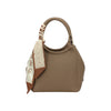 Maison Taïga taupe pebbled leather handbag with a rounded top handle and a decorative patterned silk scarf accessory