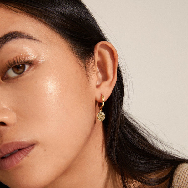 NOMAD coin huggie hoop earrings