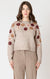 pull à col rond et appliqués floraux